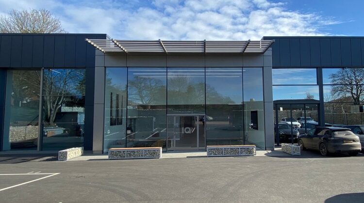architectural glazing showroom with double height automated glazing