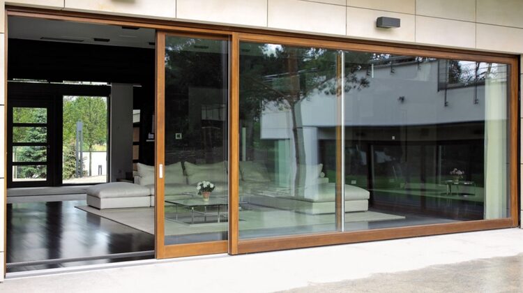 banner image of timber effect aluminium framing on an aluminium framed sliding glass door