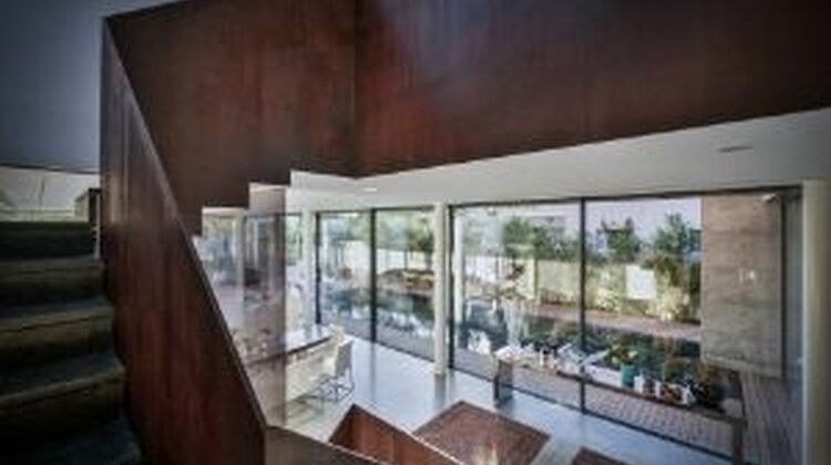 dark wood interior design elements and minimal windows slim sliders