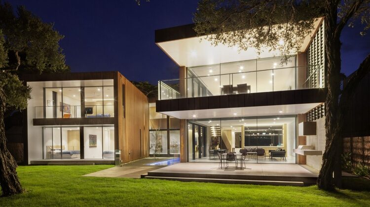 large luxury new build home in Australia that uses multiple slim sliding aluminium door systems from minimal windows with solar control and low iron glass