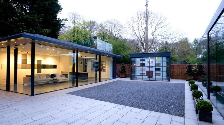 minimal windows showroom in Amersham - UK - with a wide rnage of glazing solutions including a minimal windows pivot door and multiple slim sliding doors