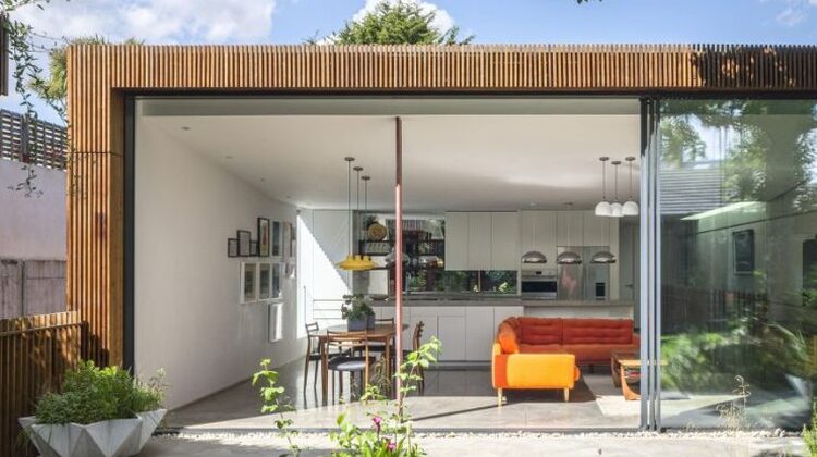 oversized slim sliding glass door in an extension dezeen awards 2022