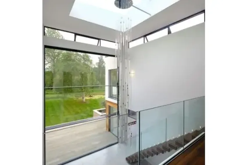 6m tall vertical sliding sash window and MARS automated sliding rooflight used to maximise natural light and ventilation