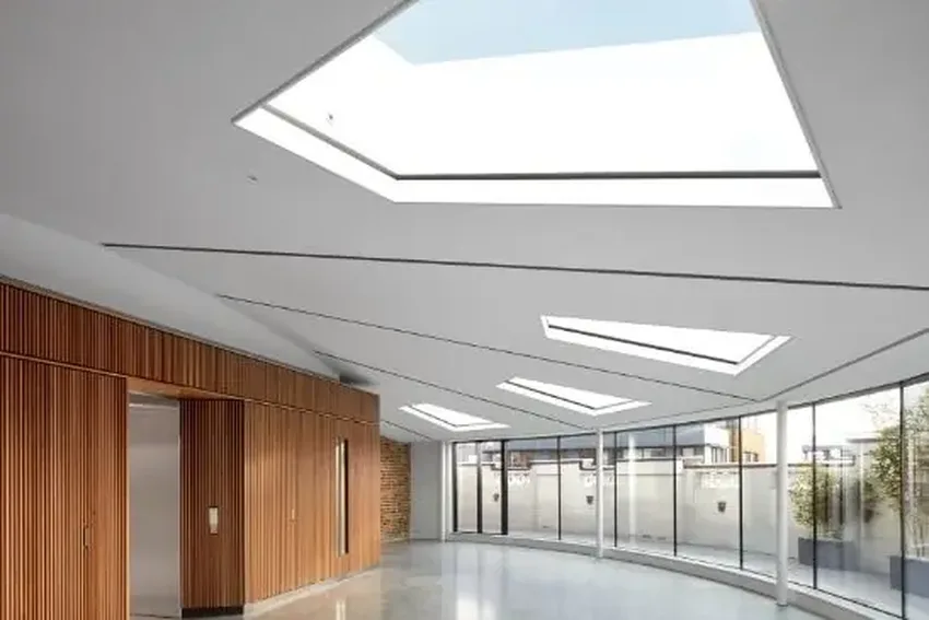 sliding glass walls with large rooflight