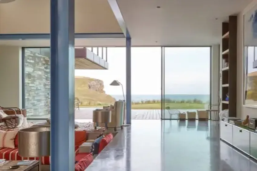 floor to ceiling slim sliding glass doors in the new build home in mawgan porth