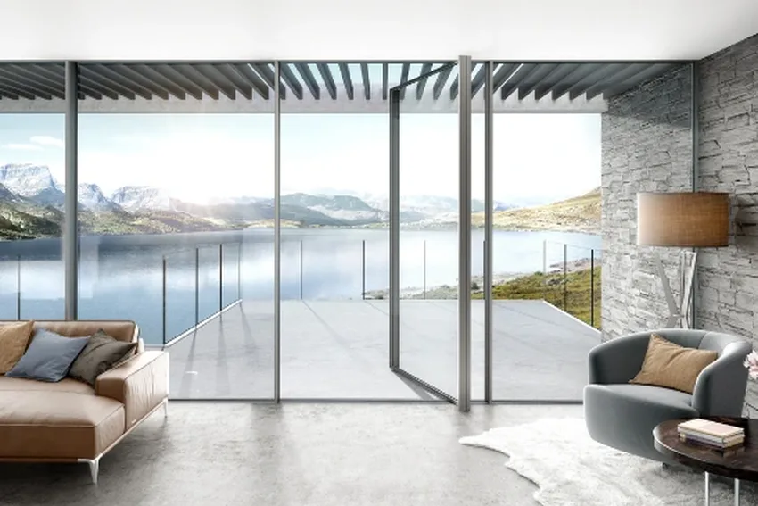 glass wall is a luxury waterfront home with an aluminium pivot door from minimal windows