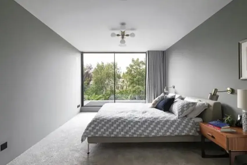 juliet balcony with framesless glass balustrade and thermally broken sliding glass door