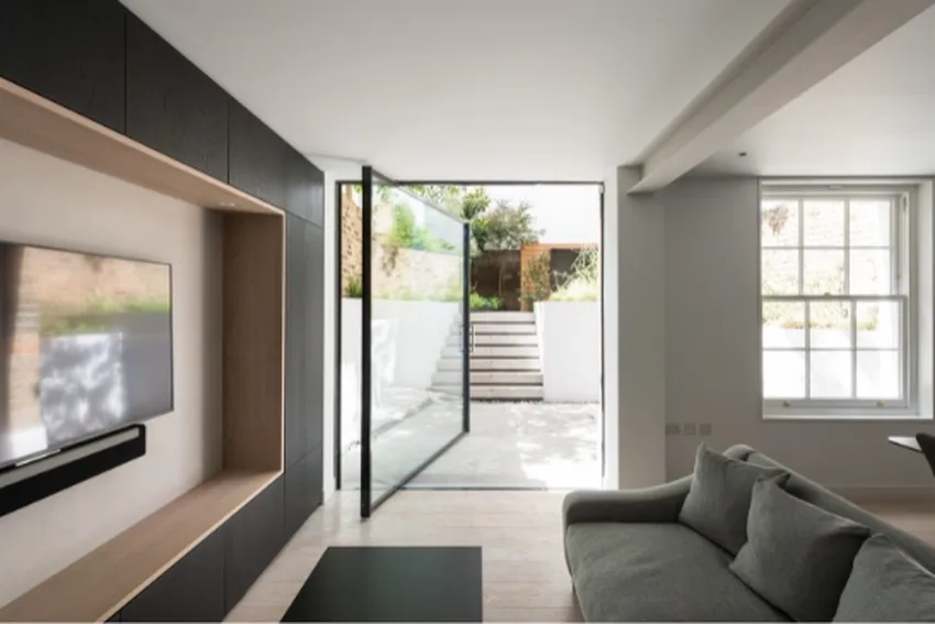 large aluminium pivot door from minimal windows