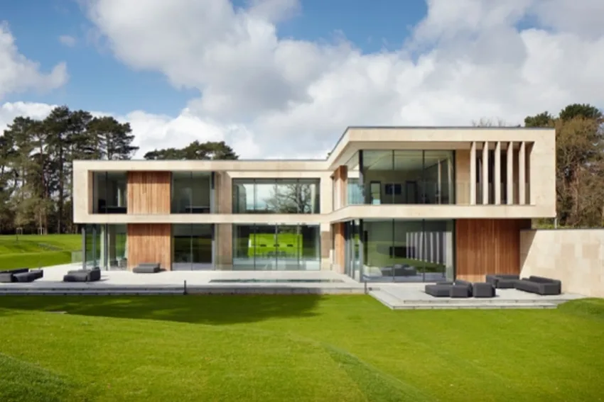 luxury new build home in a green belt are in surrey with multiple slim sliding doors from minimal windows