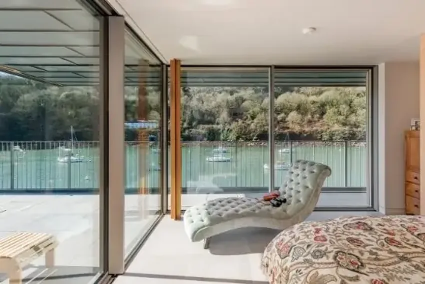 marine-grade slim sliding door in a luxury new build coastal home on the River Yealm