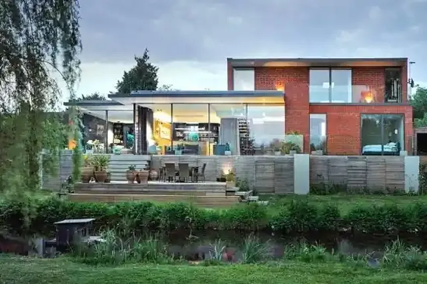 multiple aluminium sliding glass doors used in this riverside luxury new build home
