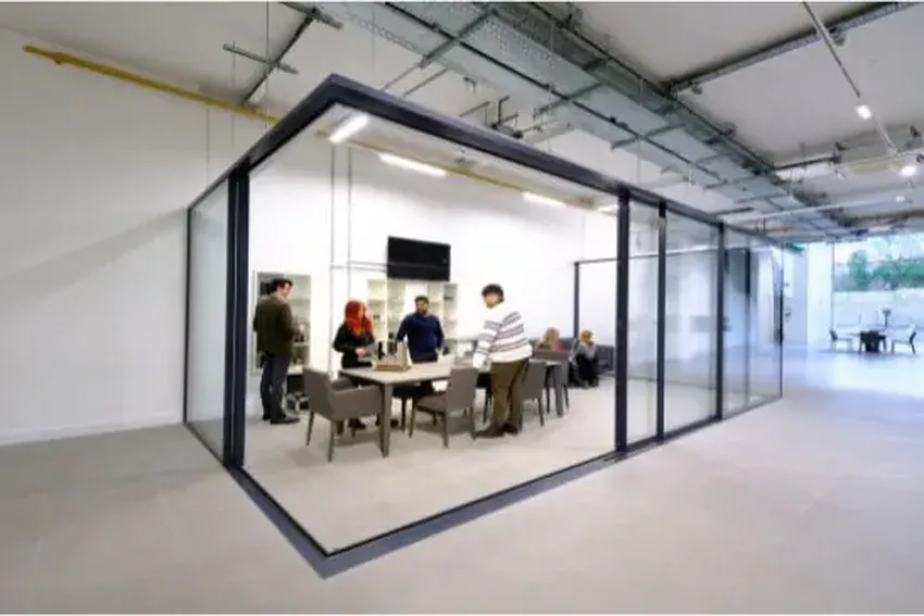 open corner configuration sliding glass doors in an architectural glazing showroom in London