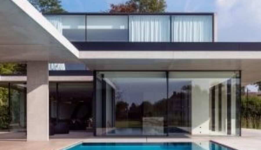 automated sliding glass door - minimal windows oversized glazing