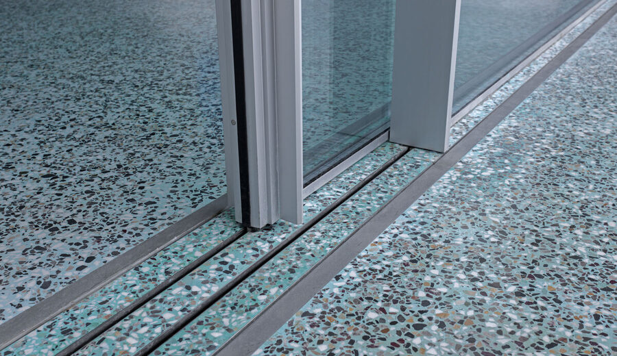 Minimal sliding glass doors Greek island villa