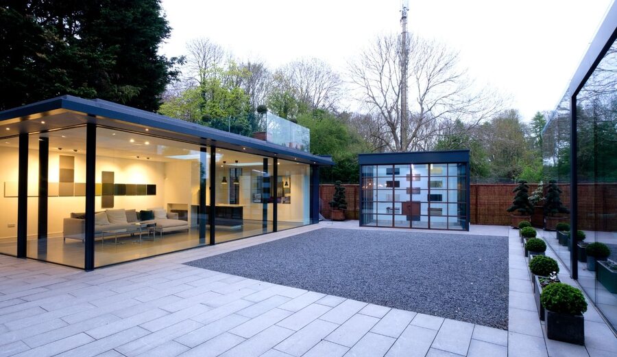 minimal windows showroom in Amersham - UK - with a wide rnage of glazing solutions including a minimal windows pivot door and multiple slim sliding doors