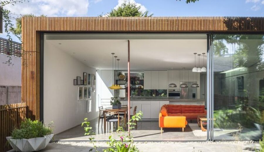 oversized slim sliding glass door in an extension dezeen awards 2022