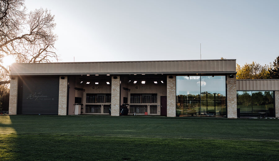 The Kingdom at the Grove - minimal windows - Large sliding glass doors for sports architecture