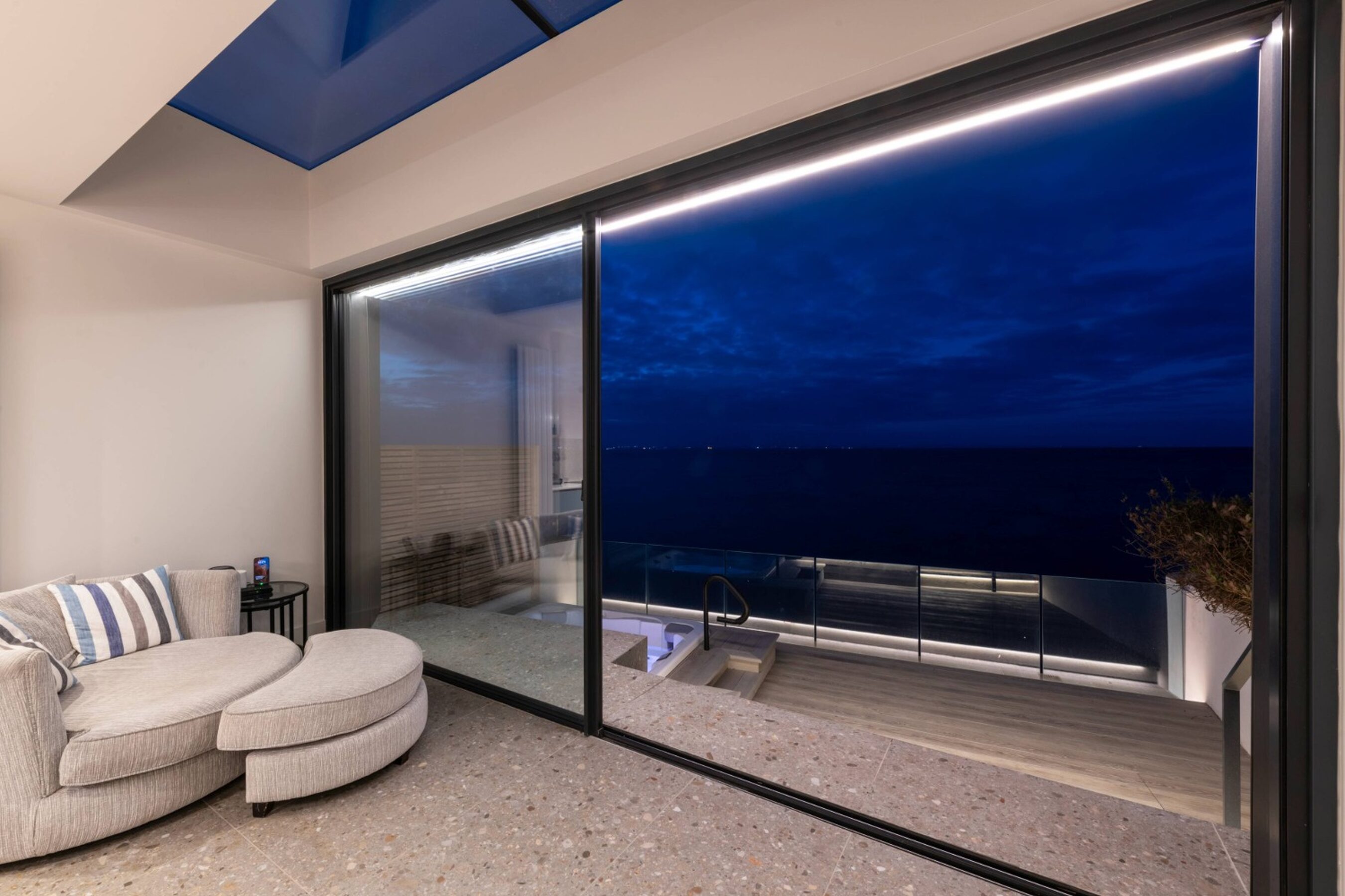 Evening View of Coastal Sliding Glass Doors in Scotland | Eastfield