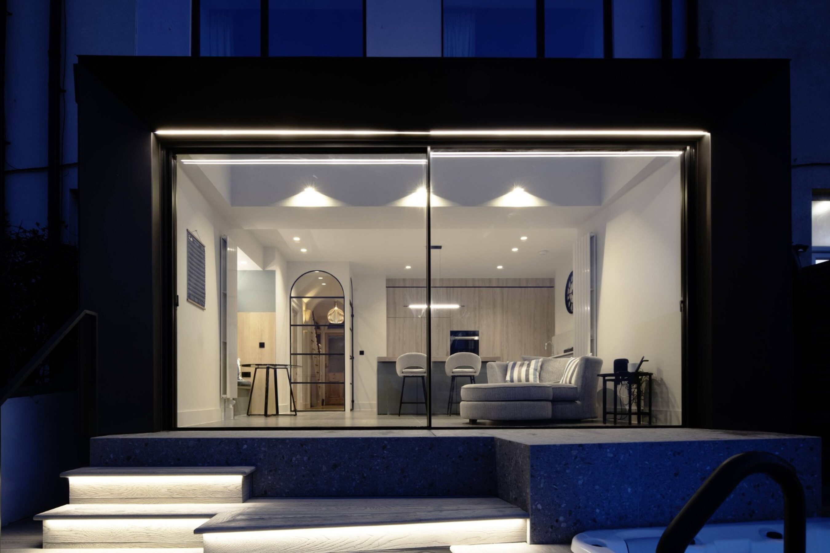 Twilight View of Coastal Sliding Glass Doors in Scotland | Eastfield