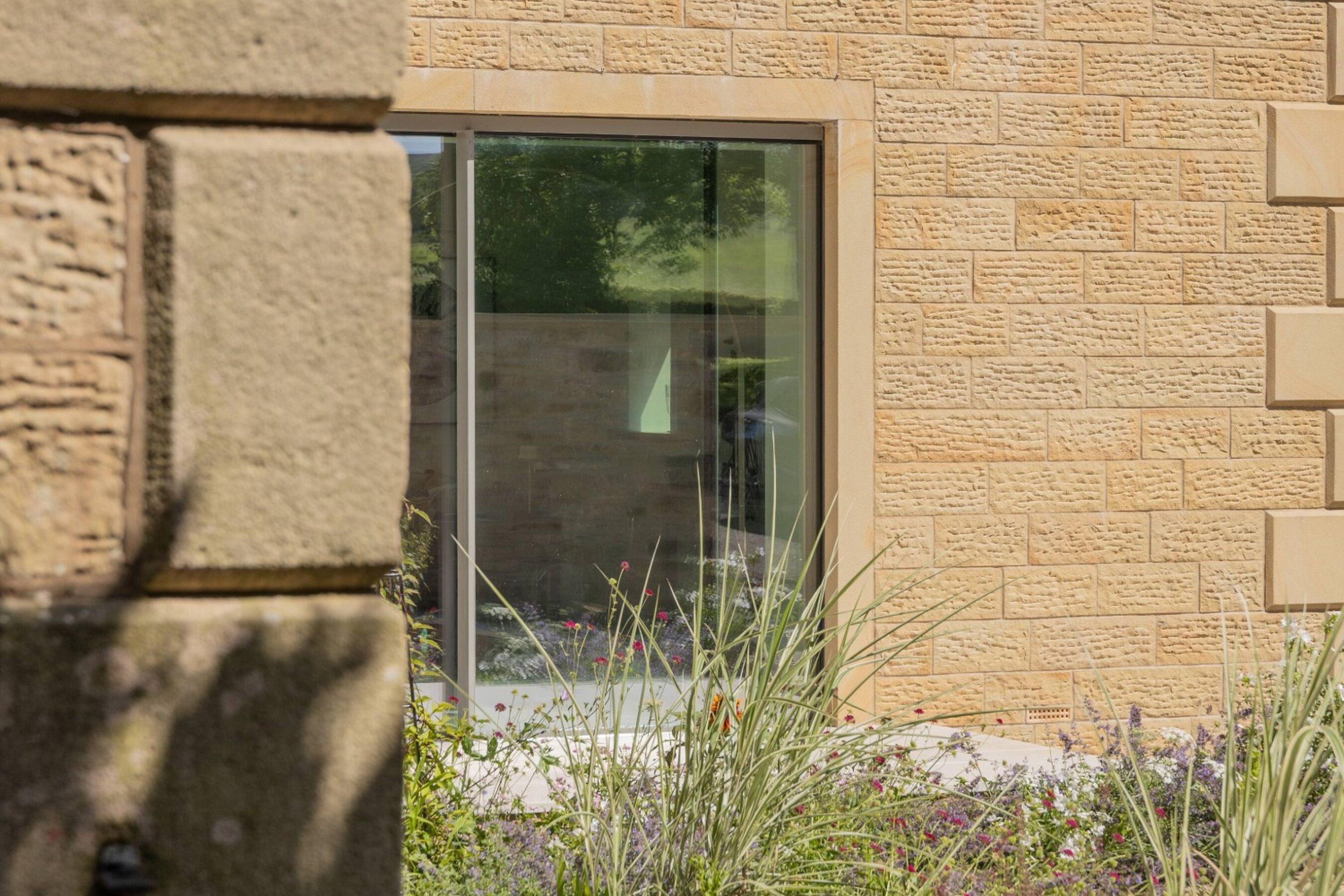 Close up of Two Panel Triple Glazed Sliding Doors in Lancashire | Martin Top Farm
