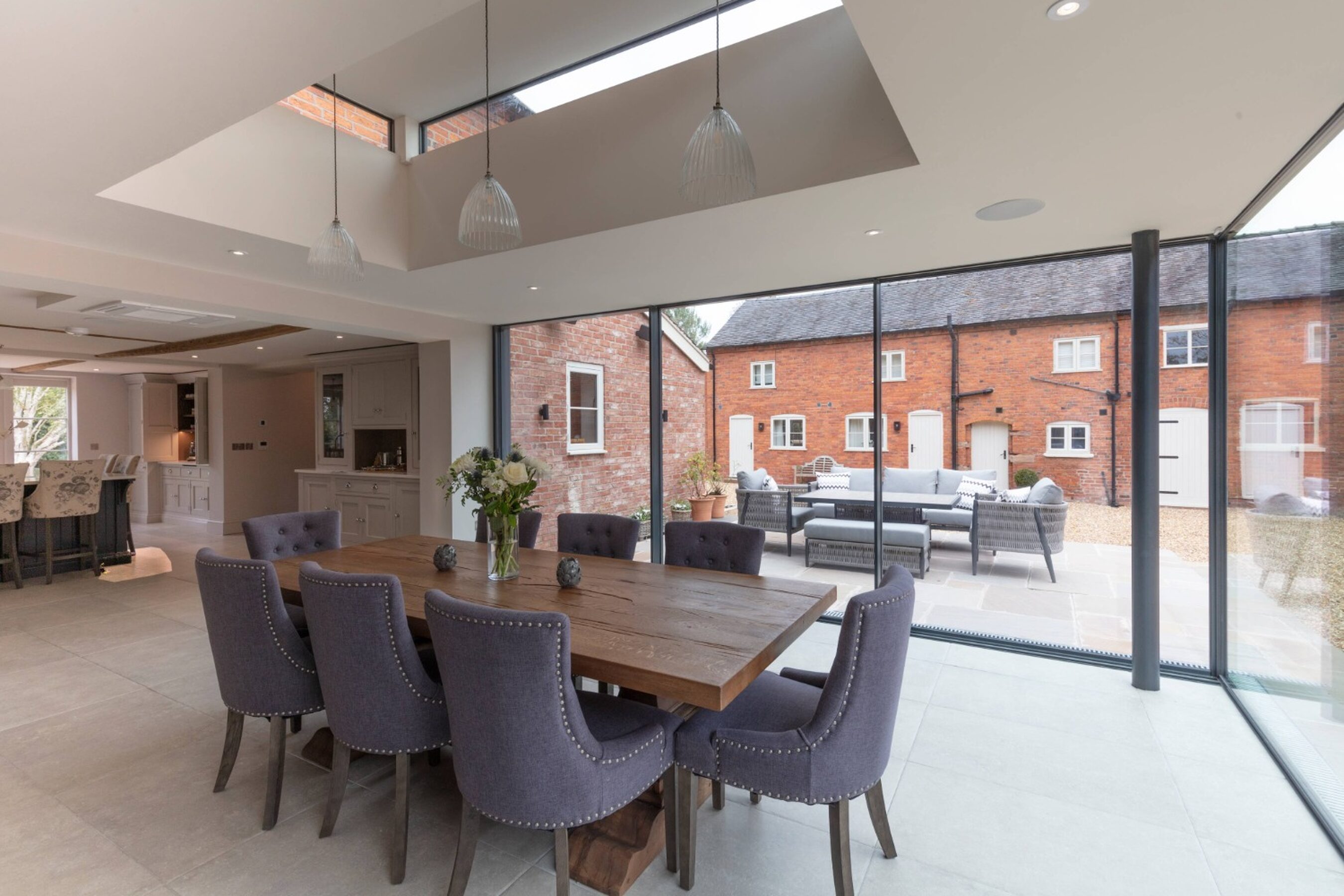 Contemporary Glass Extension with Sliding Doors in Cheshire | Illidge Green