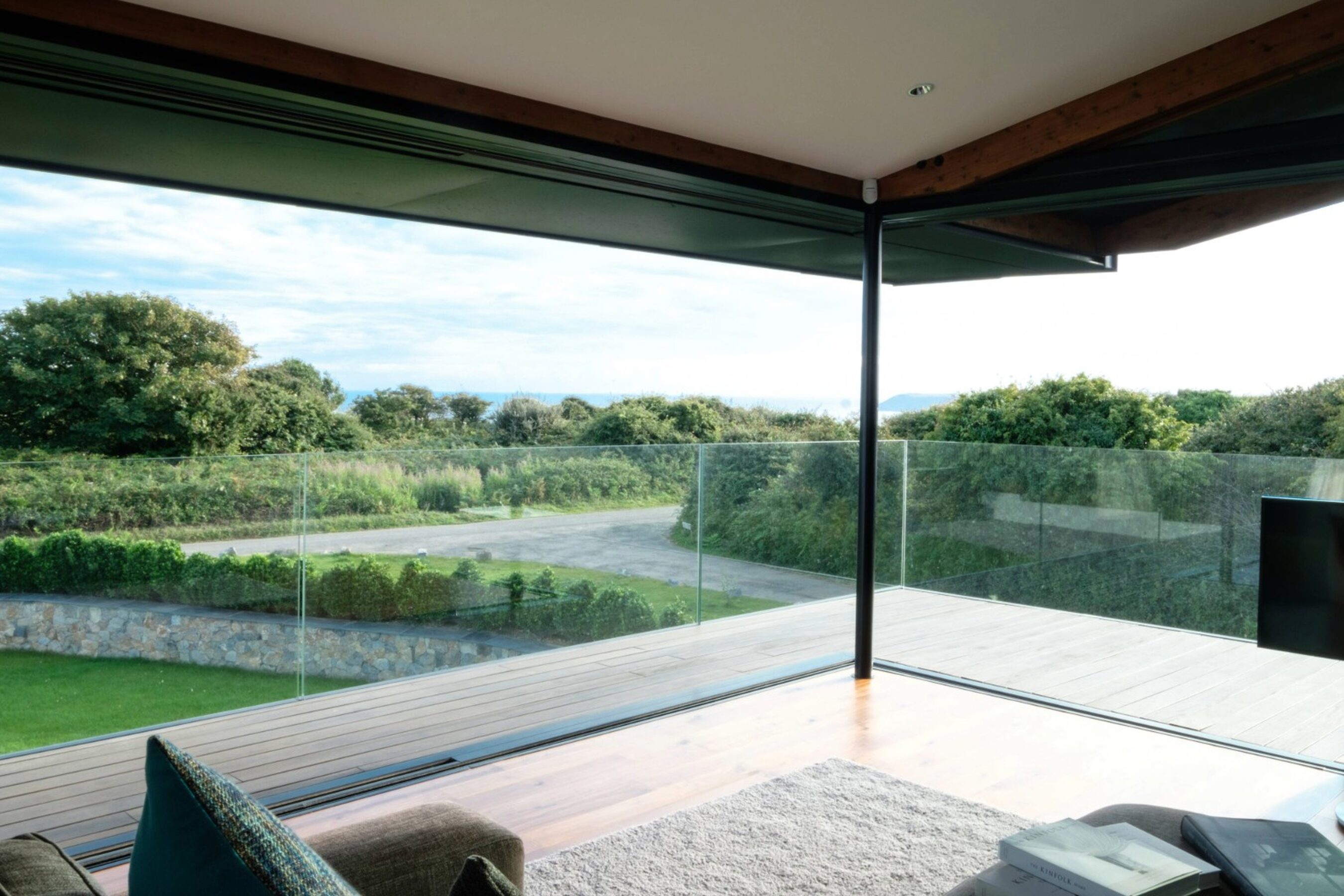 Open corner glass sliding doors in Wales | Silver House