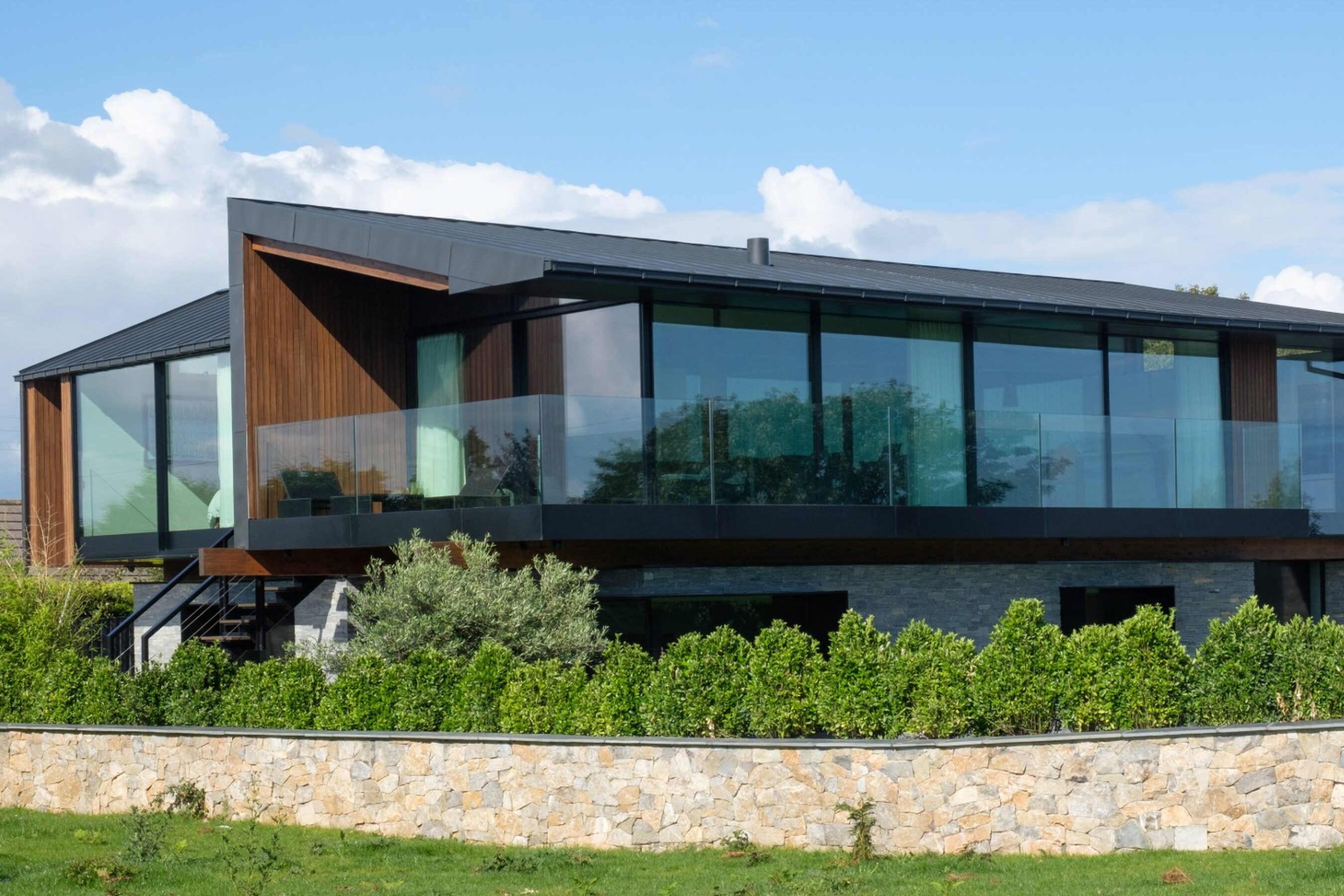 First floor glass sliding doors in Wales | Silver House