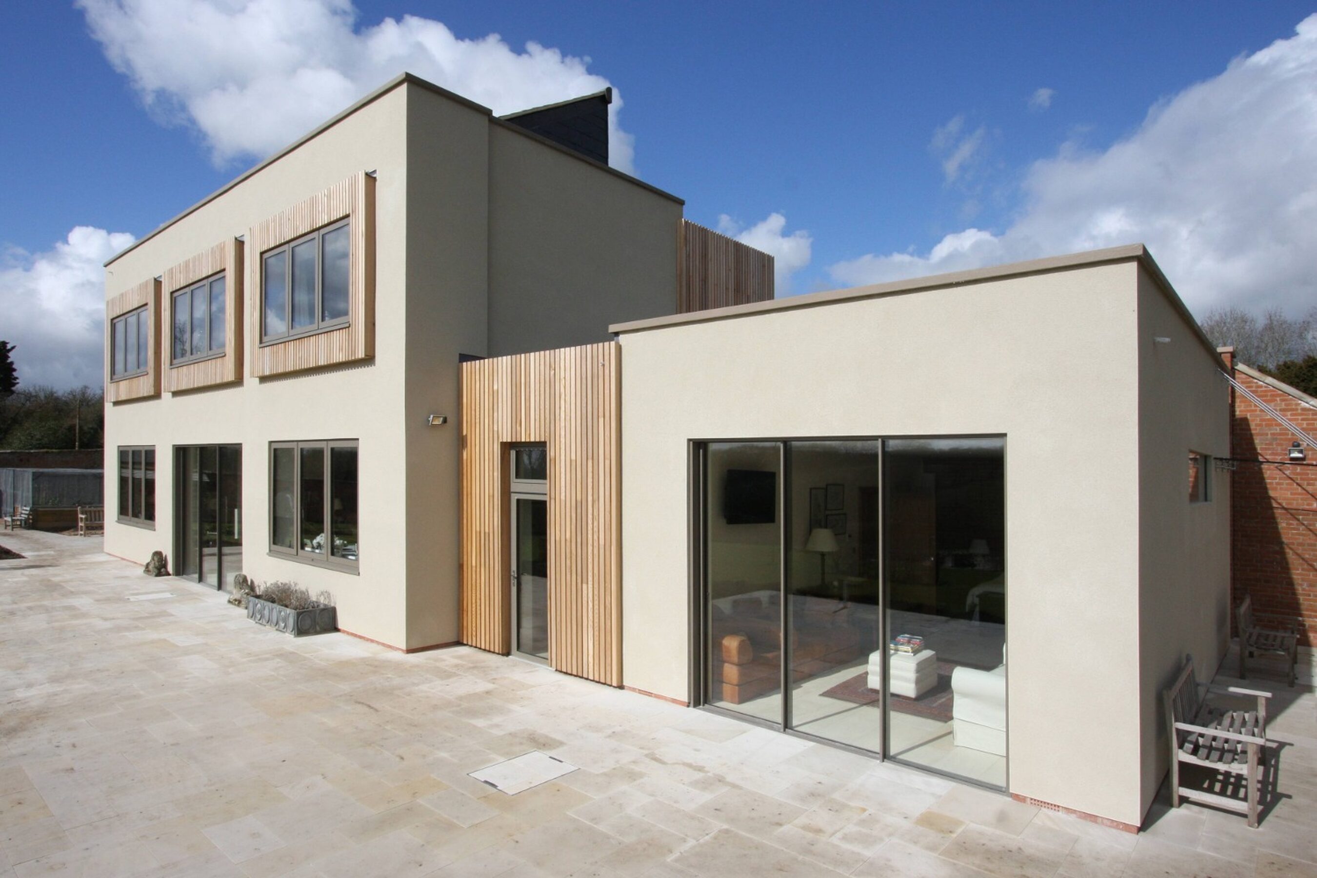 Patio View of Slim Sliding Doors in Warwickshire | Wall House