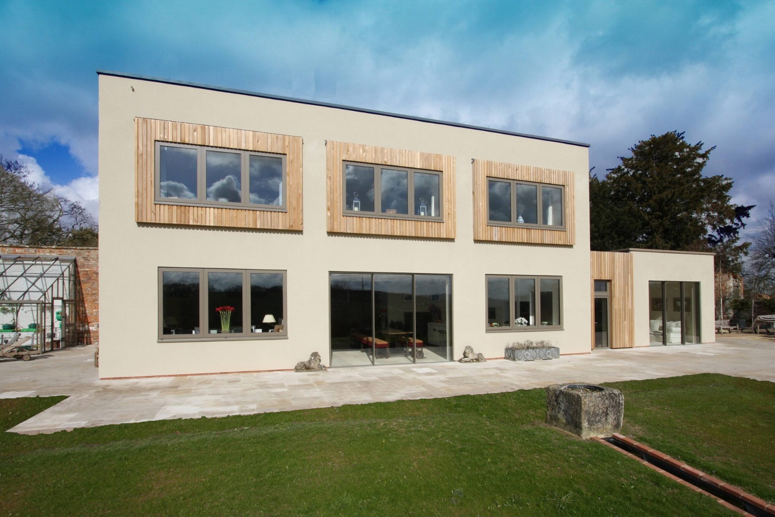 Garden View of Slim Sliding Doors in Warwickshire | Wall House
