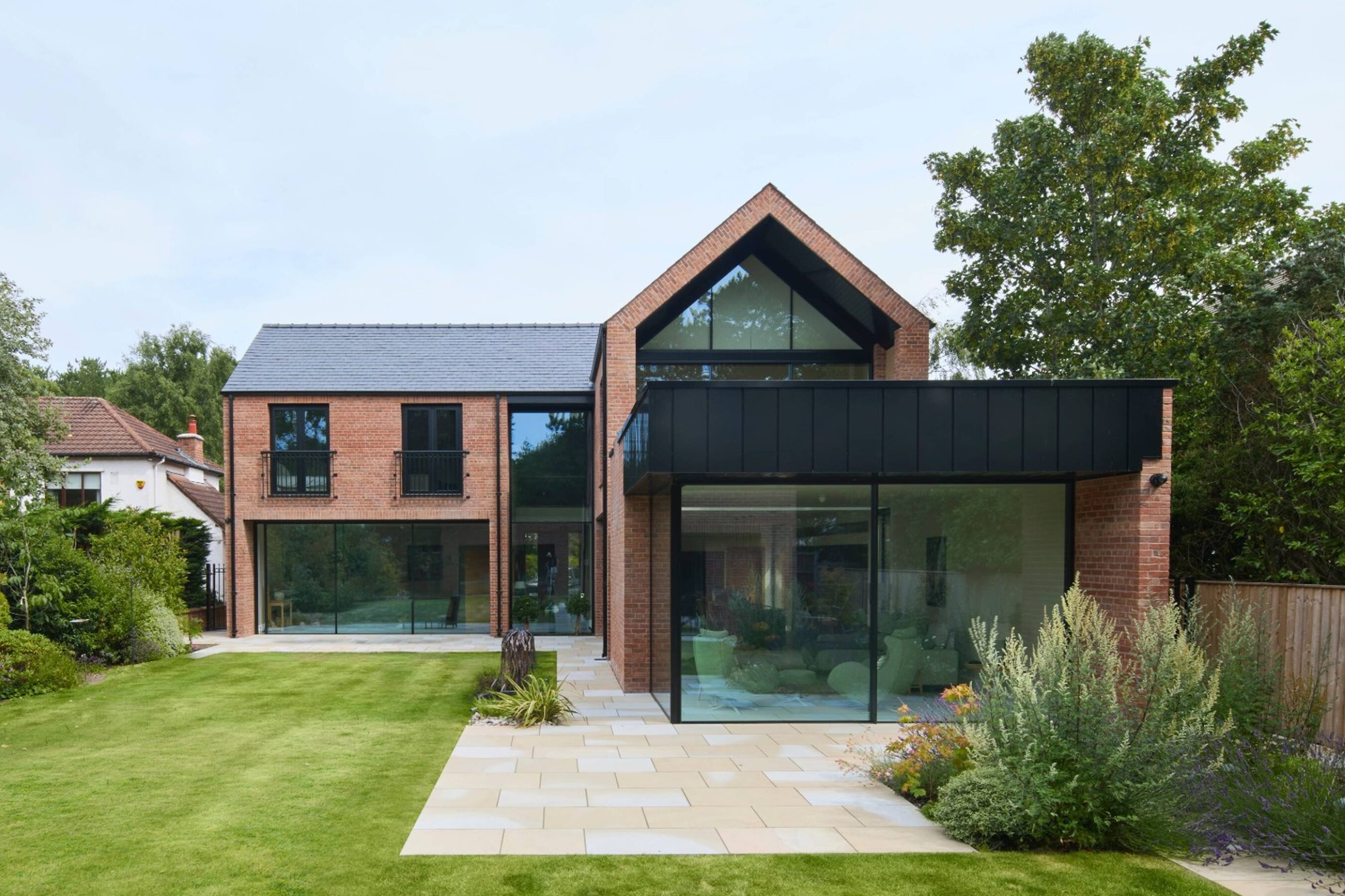 Garden View of Slim Sliding Glass Doors in Merseyside | Shireburn