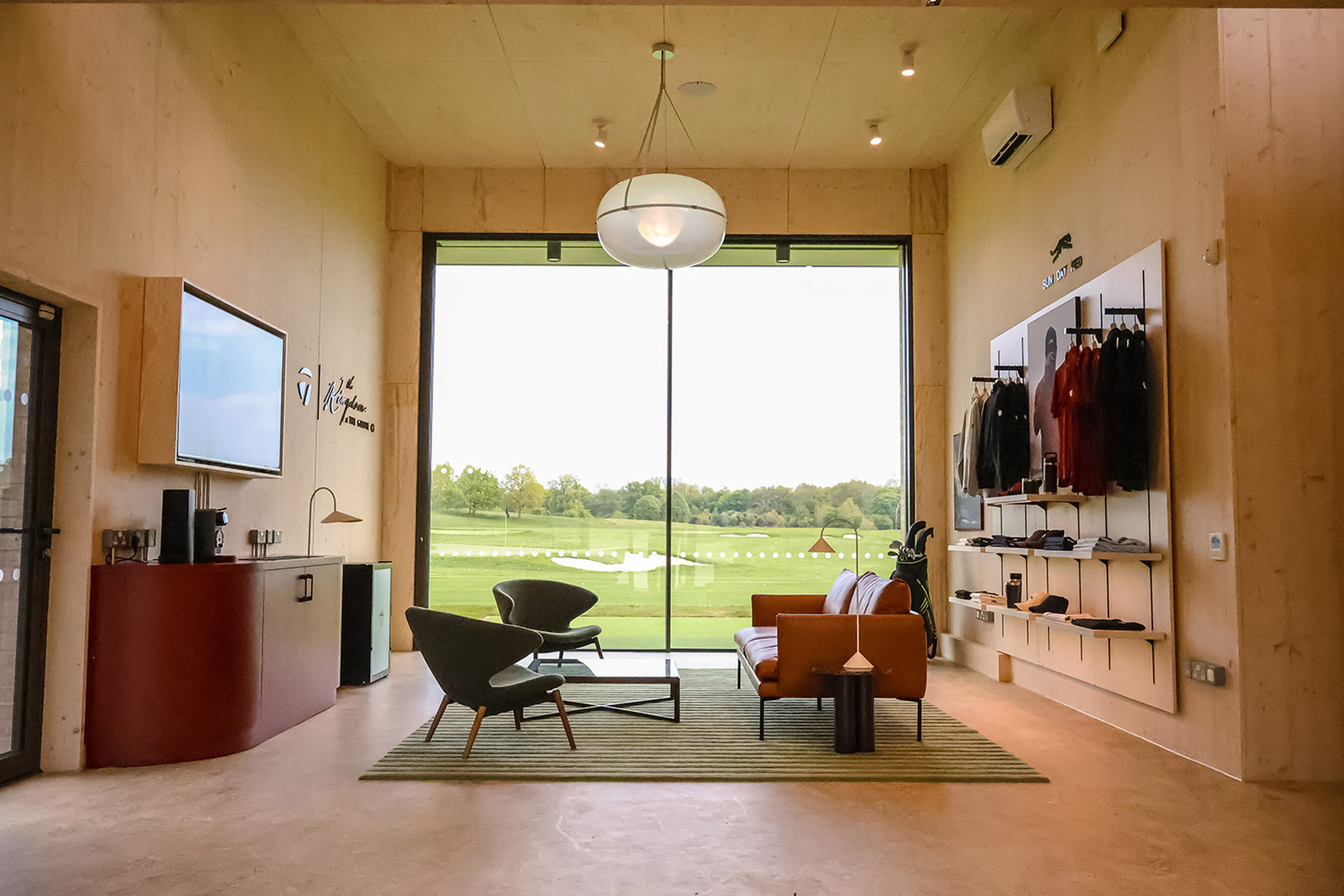 The Kingdom at the Grove - minimal windows - Large sliding glass doors for sports architecture
