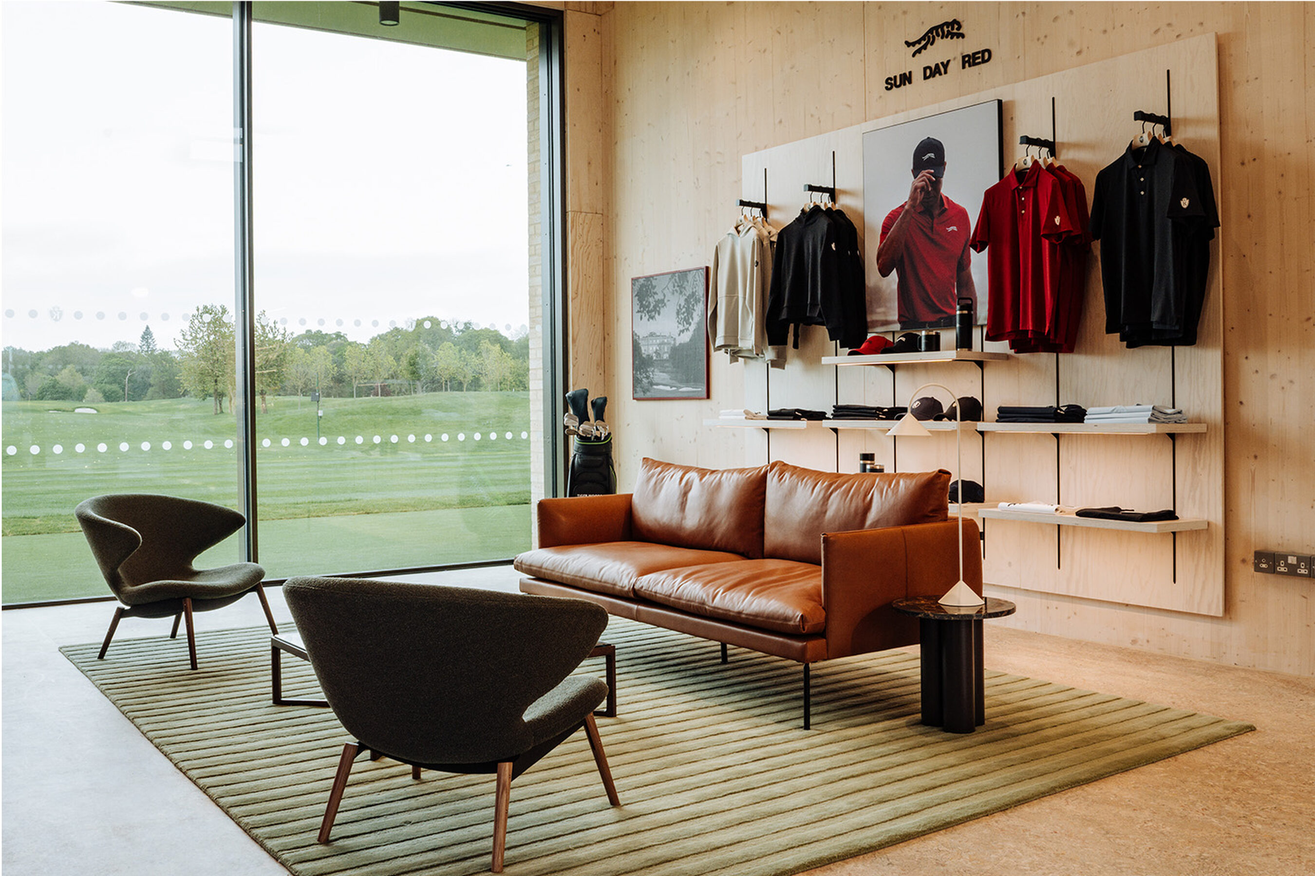 The Kingdom at the Grove - minimal windows - Large sliding glass doors for sports architecture