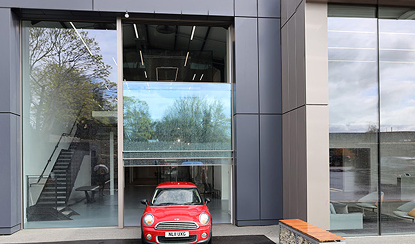 minimal windows - 6m tall doors - IQ Glass showroom